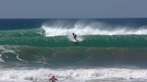 Longboarder Doing A Trick On A Big Wave Stock Footage 107609705