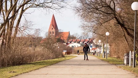 Longboarder towards the camera citybackground Stock Footage 153502099