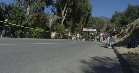 Longboarding competition in slow motion Stock Footage 70817638