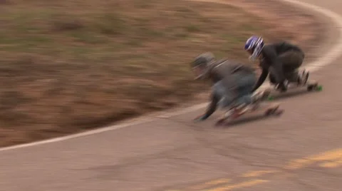 Longboarding down a hill Stockbeeldmateriaal 50981874