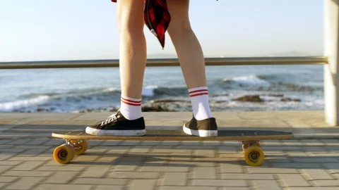 Longboarding by the ocean Stock Footage 118617408