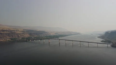 A longe bridge crossing the Columbia River connecting Oregon and Washington Stock Footage 346678251