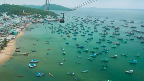 Longest cable car ride in the world on Phu Quoc island, Vietnam with fishermen Stock Footage 312814013