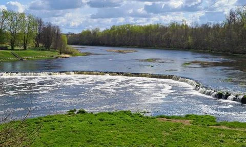 The longest waterfall on the Venta River in the first days of spring Stock Photos