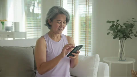 Longevity anti-aging medication for asia woman. Menopause awareness diagnosis Vidéo 303871637