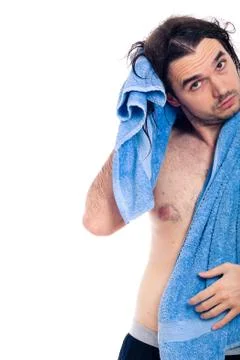 Longhaired man using towel Stock Photos