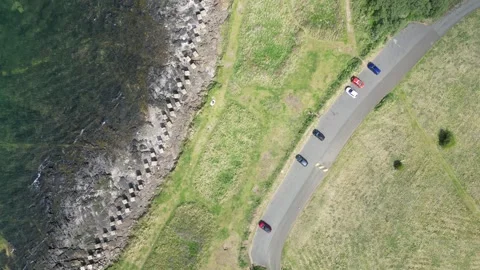 Longniddry Drone Top Down Tracking Up Over Shoreline Sea Defences Stock Footage 326769754
