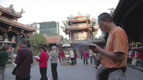 Longshan Temple - side angle dolly shot with people chanting Stock Footage 44236047