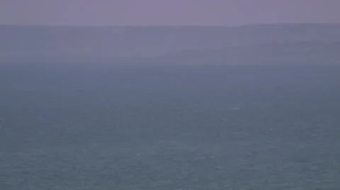 Longshot of a large ship sailing into the view of the camera. Stock Footage 39483696