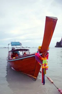 Longtail boat beached at Phi Phi Don island, Thailand. Stock Photos