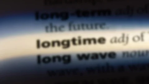 Longtime word in a dictionary. Stock Footage 99562880