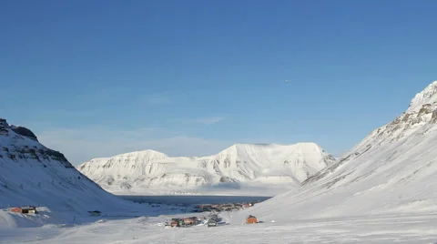 Longyearbyen, Svalbard. The small town is surrounded by mountains. Stock Footage 61707688
