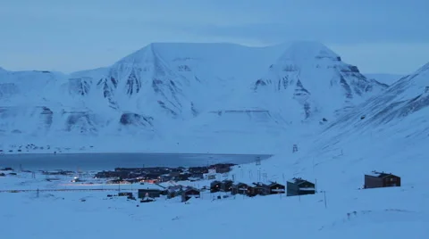Longyearbyen, Svalbard. The small town is surrounded by mountains. Polar night. Video stock 61707822
