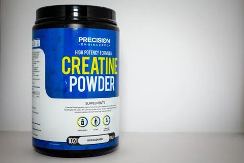LonPrecision Engineered creatine powder against a plane white background Stock Photos