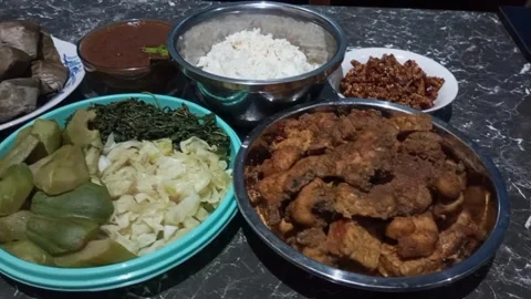 Lontong pecel rice Stock Footage 243059399