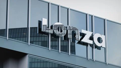 Lonza Stock data presented on the logo of the office facade editorial Stock-Fotos