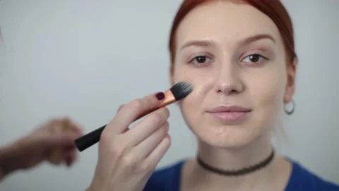 The look and the scene of how I do makeup and visage, paint lips, eyes Stock Footage 129736989