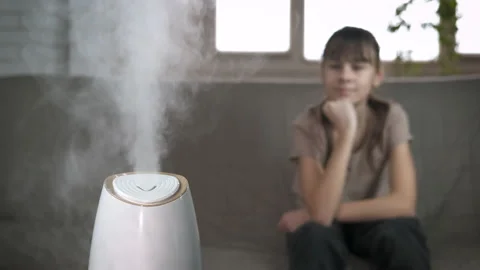 Look at aromatherapy diffuser steam. Stock Footage 219755345