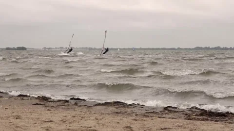 Look from the beach to the surfers Video stock 254468795