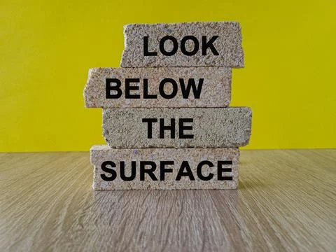 Look below the surface symbol. Foto stock