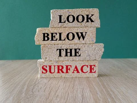 Look below the surface symbol. Stock Photos