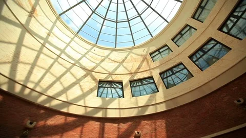 Look from below at walls painted with maps and holding glass ceiling Stock Footage 73975243