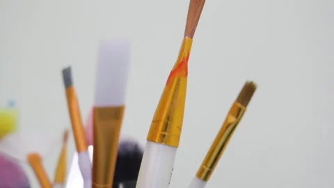 A look at the brass plating on art paint brushes. Stock Footage 345171141