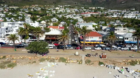 A look at the busy and bustling main street of Camps Bay in Cape Town Stock Footage 170725883