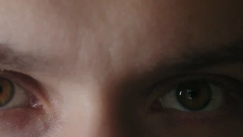 A look at the camera of a thirty-year-old man Stock Footage 93847393