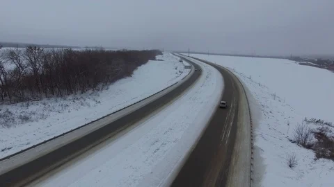 Look into the distance on a winter road Stock Footage 85830380