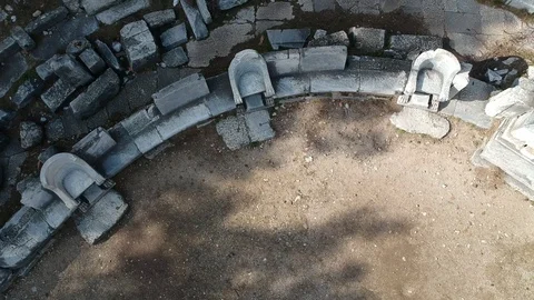 Look down to the altar while ascending at ancient theater Stock Footage 103987956