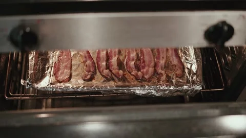 Look down backon in open oven Stock Footage 300509273