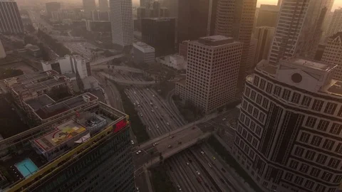 Look down on busy freeway traffic in Los Angeles on sunny morning Stock-Footage 71552248