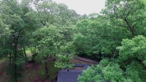Look down from canopy of lake house Stock Footage 77698012