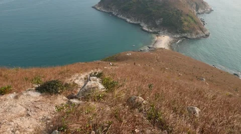 Look down to natural sea washed sand bridge between two islands Vídeos de archivo 57322177