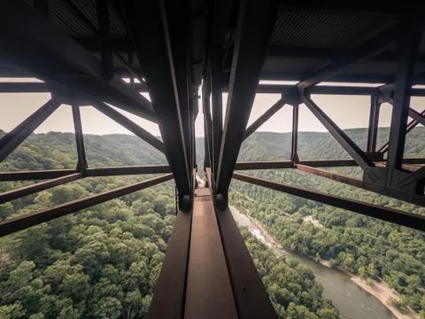 Look down to river from inside of West Virginia Gerge steel Bridge, usa Stock Photos