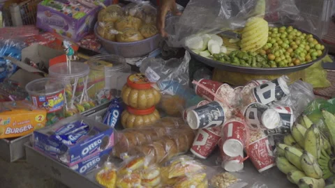 Look down at snacks stall in village market siem reap Stock Footage 229825507