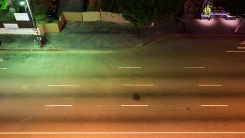 Look Down View of Traffic Passing on a City Street Video stock 76775683