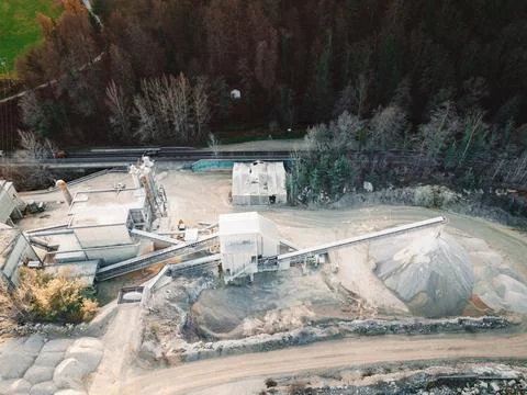 A look down at the work that is happening in a small private owned quarry Stock Photos