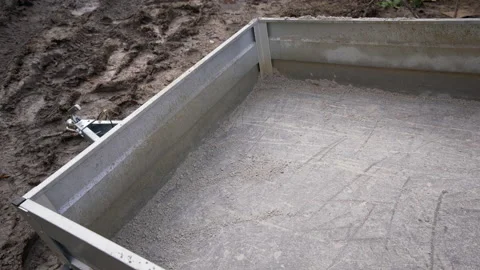 Look into an empty car trailer parked in the mud Stock Footage 158977813