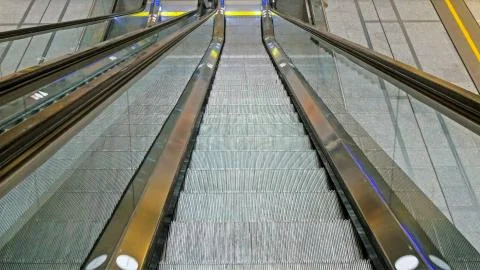 The look of the escalator while going down Photos