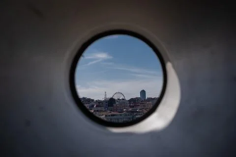 Look at the ferris wheel through the plastic pipe Stock Photos