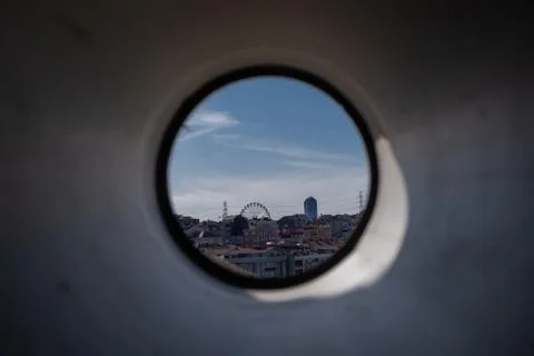 Look at the ferris wheel through the plastic pipe Stock Photos