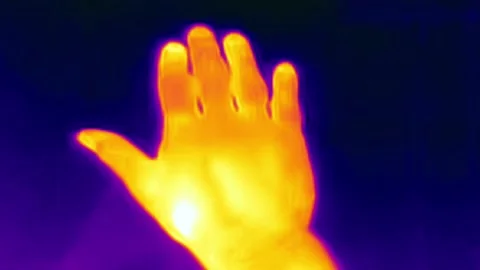 A look of a hand on a thermal camera in Estonia Stock Footage 236152267