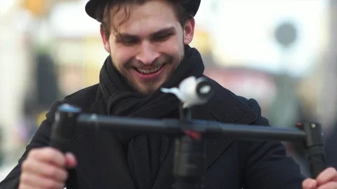 Look at Indie Filmmaker with Electronic Stabilizer Stock Footage 73026328