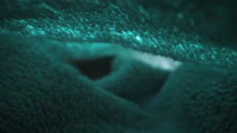 A look inside the blue thick fabric on the table Stock Footage 135705095