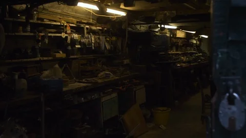 A look inside a creative, but messy wood work shop. Stock Footage 100917518