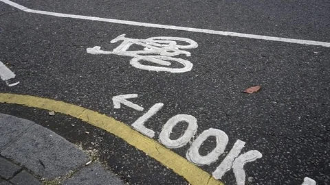 Look Left Written Sign Warning on the Road Video stock 80464616