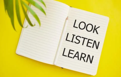 Look listen learn text written in Notebook Stock Photos