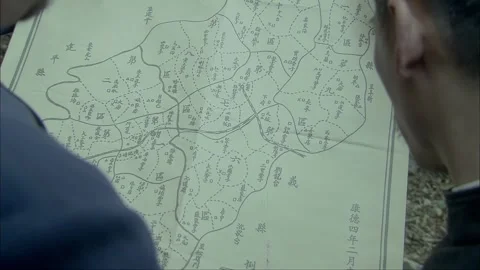 Look at a map Stock Footage 302952660